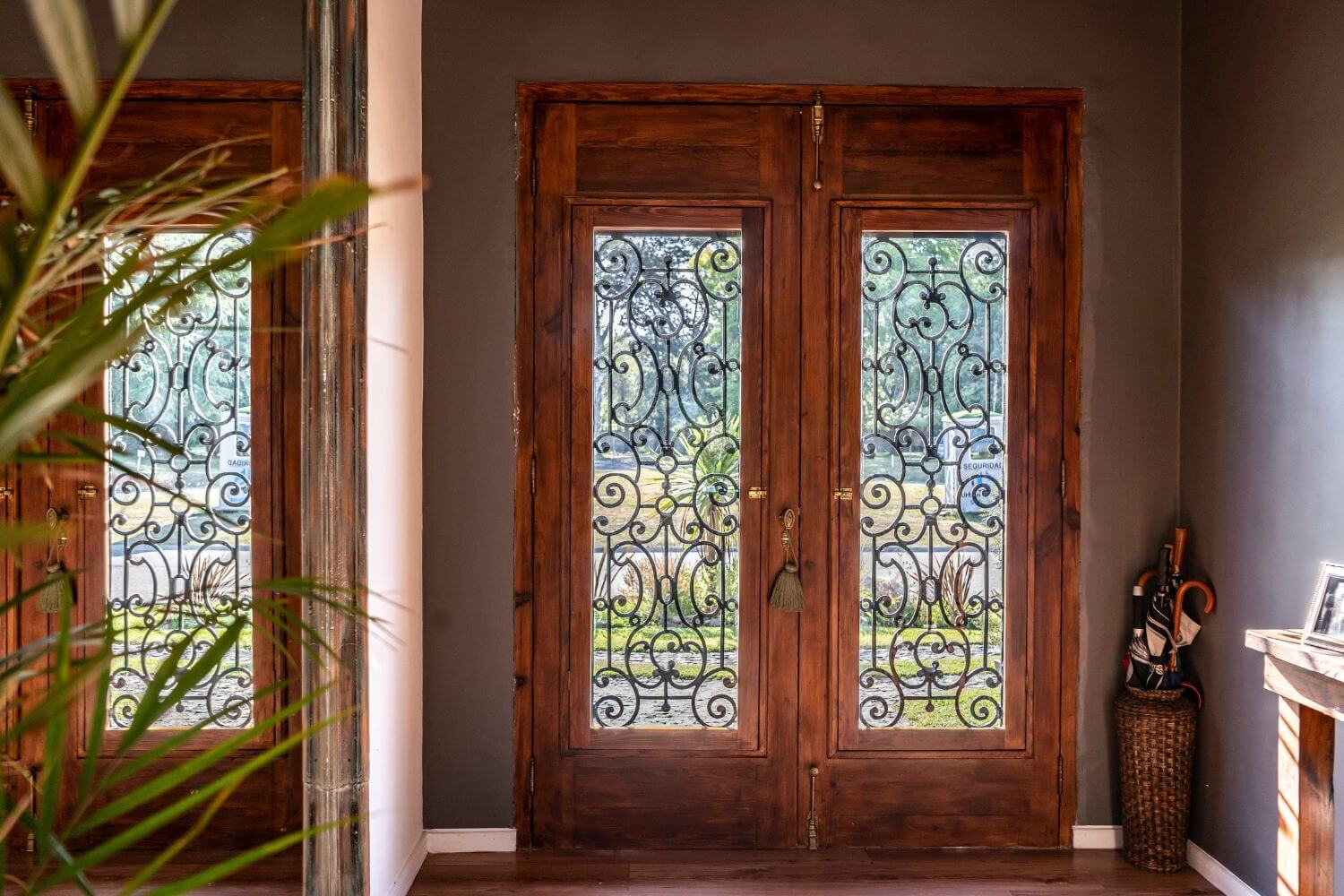 large wood and iron front door