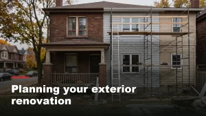Exterior renovation in progress on a Toronto house with new siding partially installed beside the original wall
